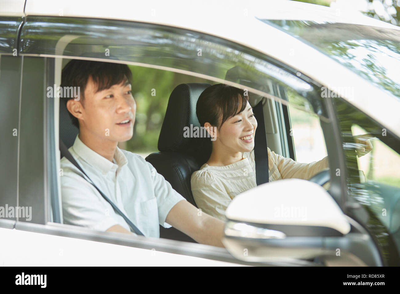 Japanese couple in the car Stock Photo Alamy