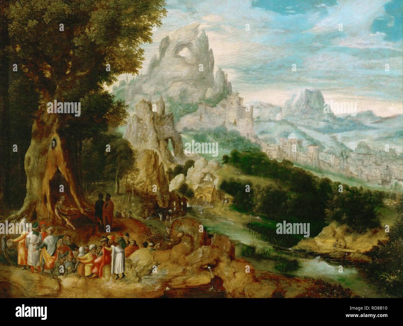 Landscape with Saint John the Baptist Preaching. Museum: Art History Museum, Vienne. Author: Herri met de Bles, Henri de. Stock Photo