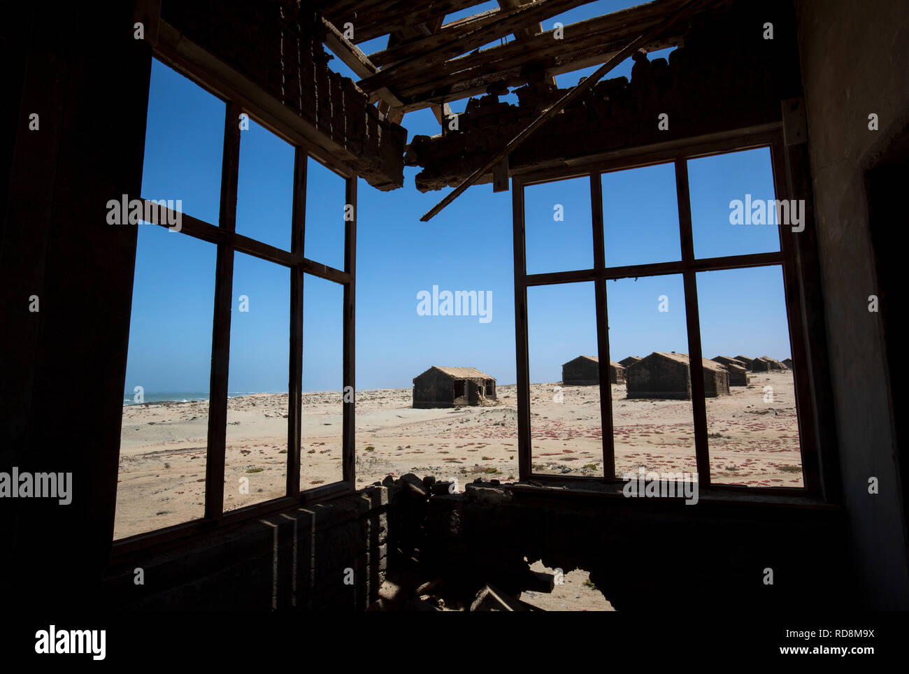 View through windows in abandoned Mining Town of Elizabeth Bay - near Luderitz, Namibia, Africa Stock Photo