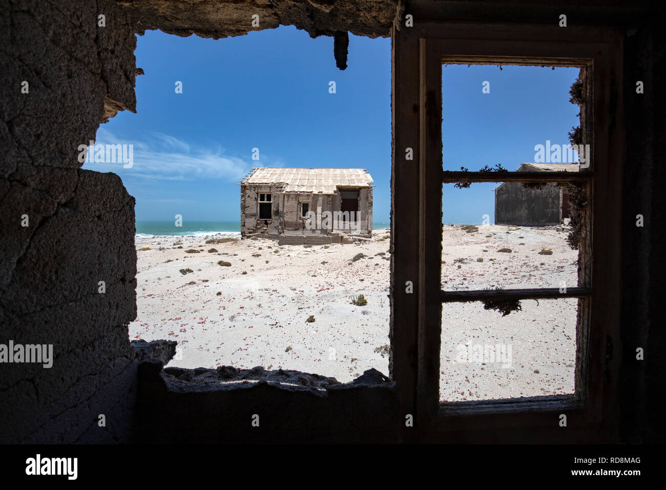 View through windows in abandoned Mining Town of Elizabeth Bay - near Luderitz, Namibia, Africa Stock Photo