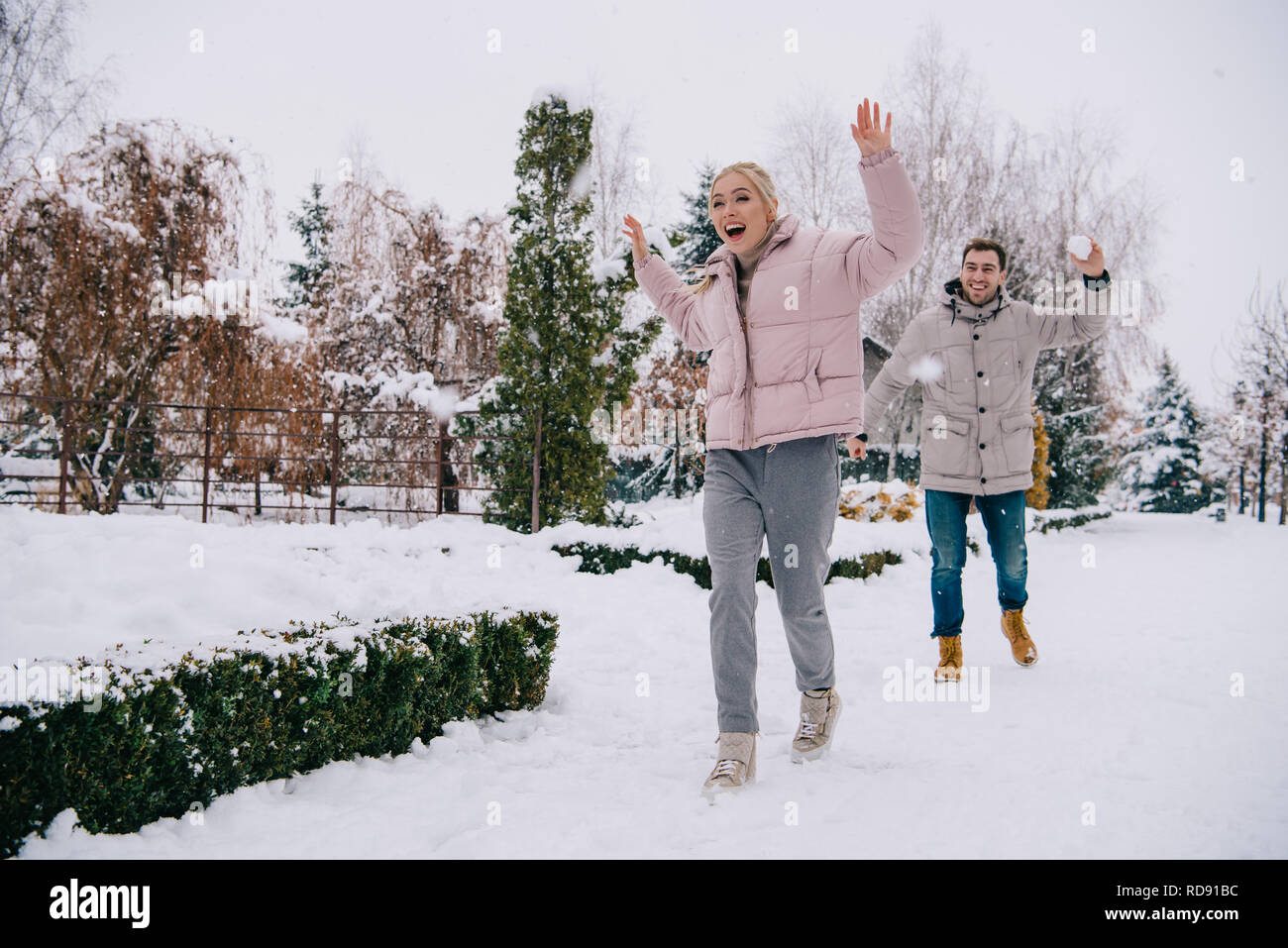 Blonde girl running at the park hi-res stock photography and images - Alamy