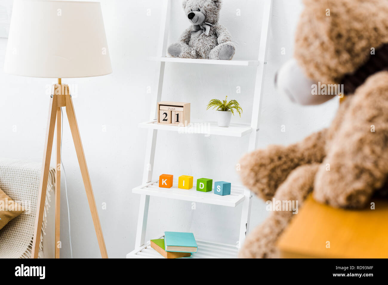 modern interior of nursery room with rack and toys Stock Photo
