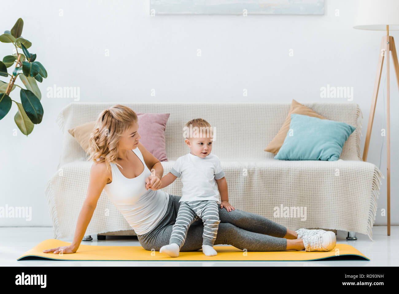 Woman resting son on hi-res stock photography and images - Alamy