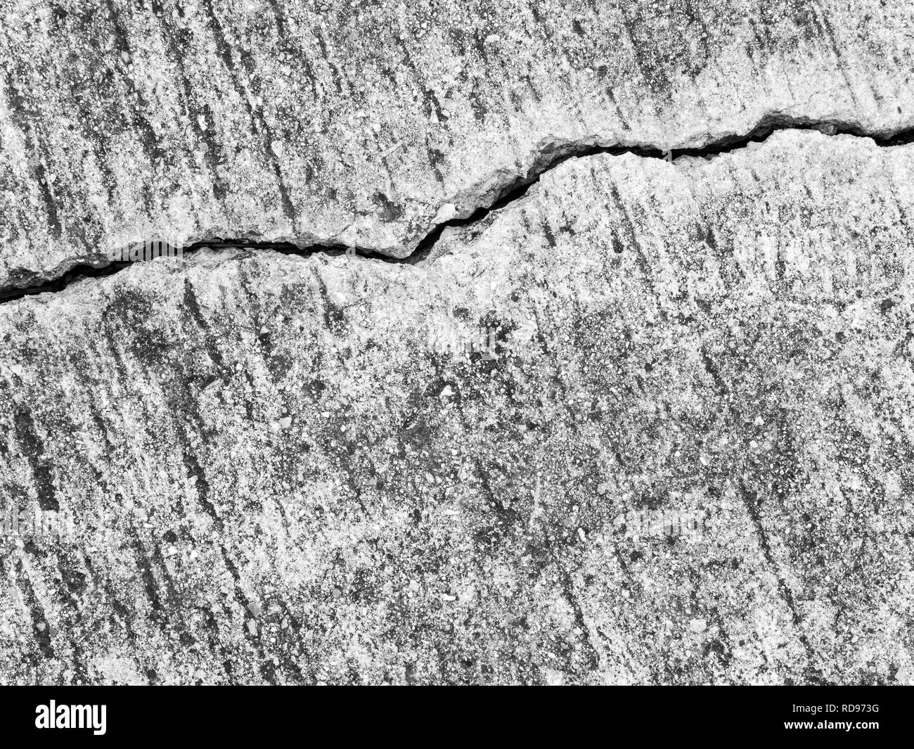 Cracked and separated on concrete floor Stock Photo