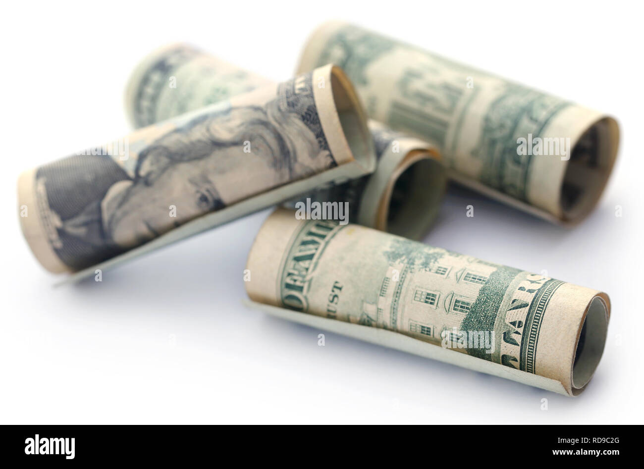Rolled US Dollar over white background Stock Photo