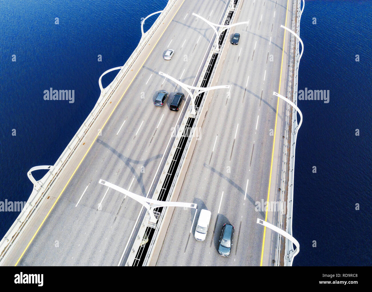 Aerial view of highway in the ocean. Cars crossing bridge interchange ...