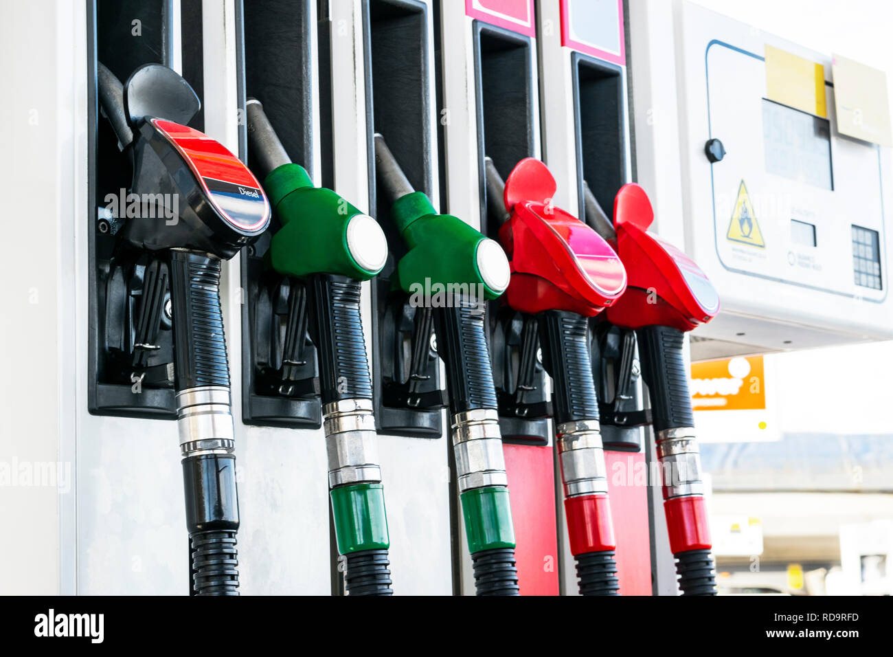 Gasoline and diesel distributor at the gas station. Gas pump nozzles