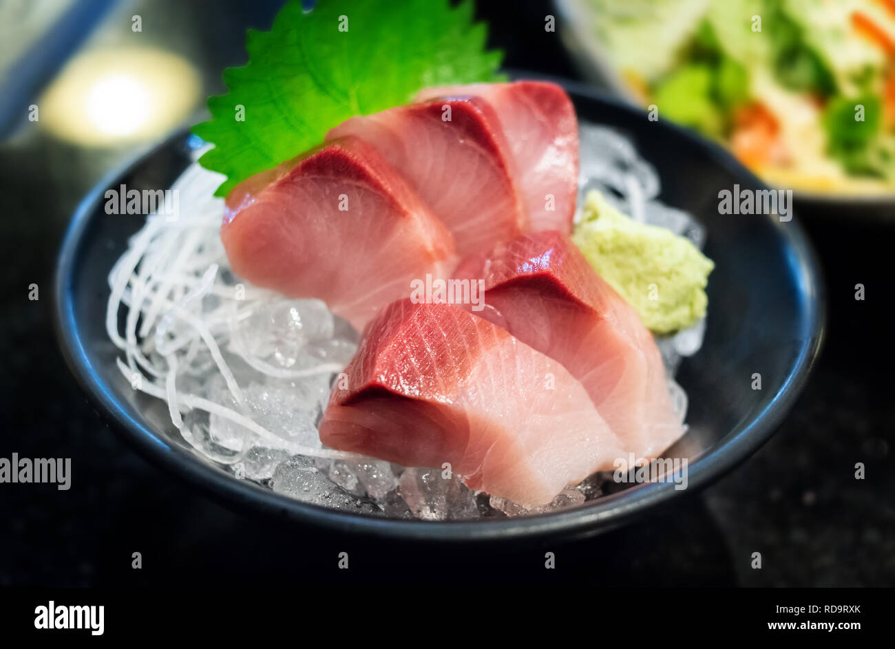 Raw Yellow tail fish or Hamachi sashimi in Japanese food name photo