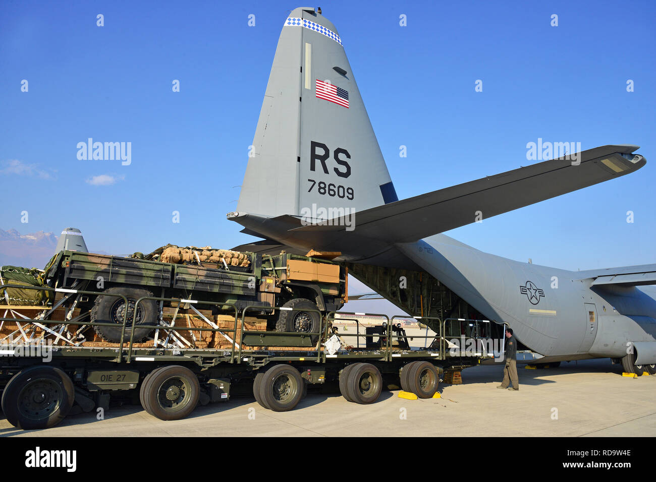 One Light Medium Tactical Vehicle from the Echo Company, Brigade Engineer Battalion, 173rd Airborne Brigade, are rigged for a heavy parachute drop and prepared to be loaded into a U.S. Air Force C-130 Hercules from the 86th Air Wing during Spartan Exercise at Aviano Air Base, Italy, January 14, 2019,. The 173rd Airborne Brigade is the U.S. Army Contingency Response Force in Europe, capable of projecting ready forces anywhere in the U.S. European, Africa or Central Commands' areas of responsibility . (U.S. Army photo by Paolo Bovo) Stock Photo