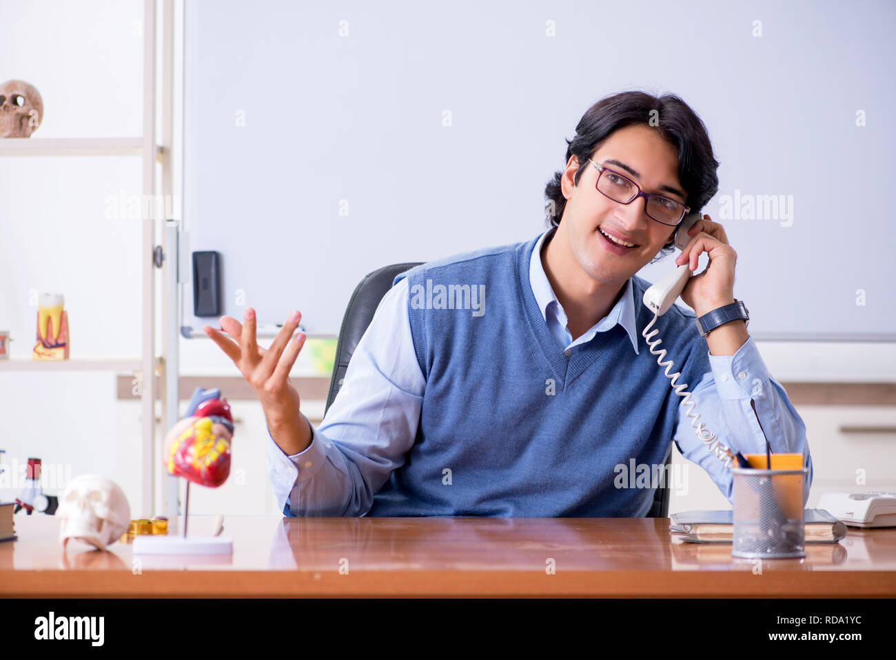Young lecturer teacher teaching anatomy Stock Photo Alamy