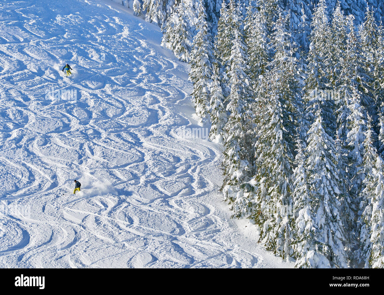 Ski tour walker ski downhill at the mountain Alpspitz in dangerous