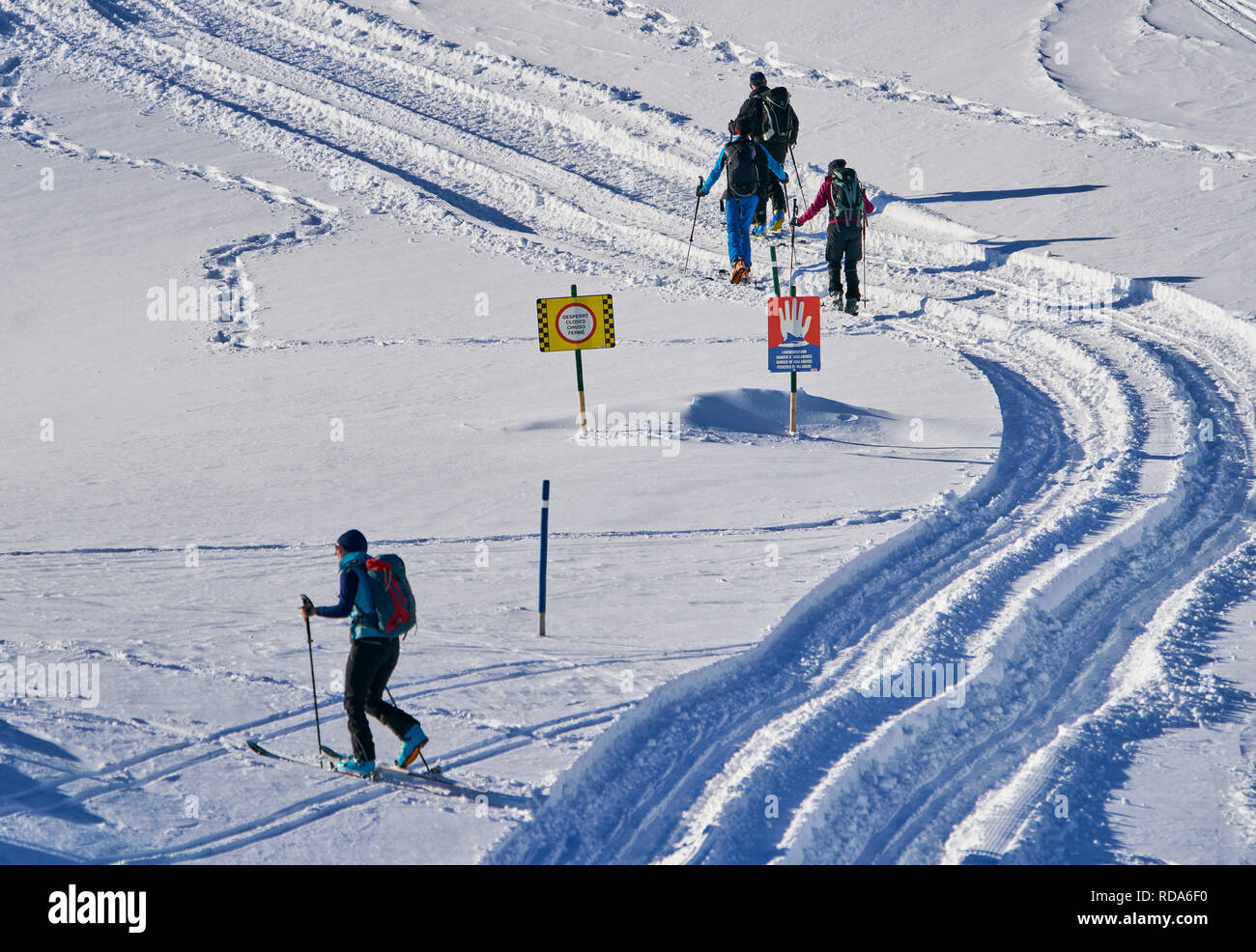 Ski tour walker walk up to the mountain Alpspitz in dangerous avalanche