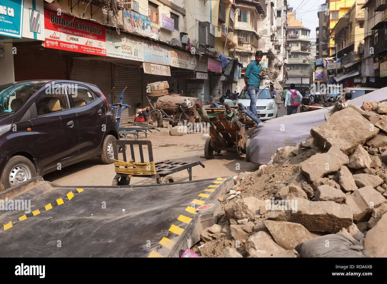 View of a dilapidated lane in Bhendi Bazaar area Mumbai, India Stock Photo