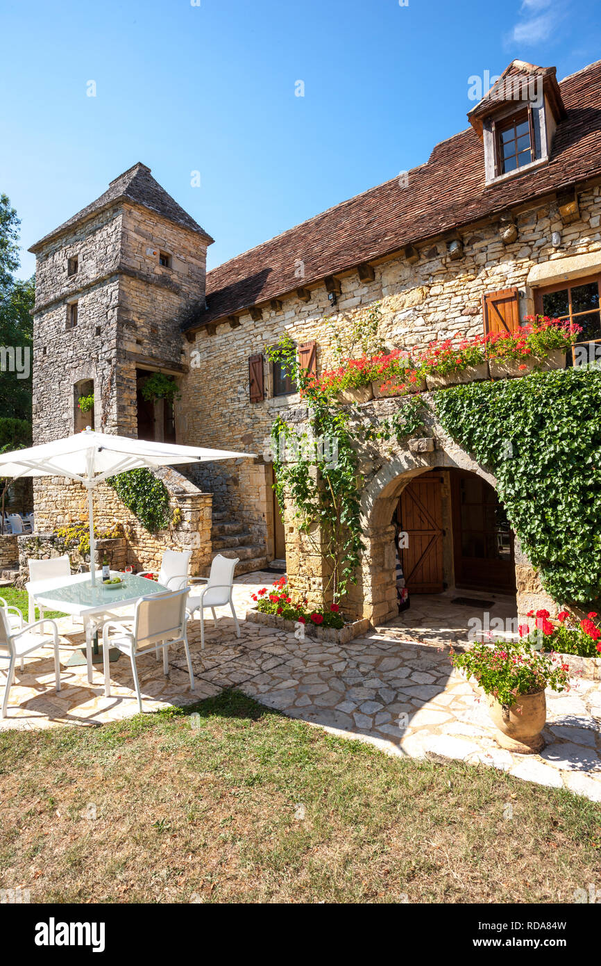 Stunning old stone French farmhouse in the sunshine Stock Photo