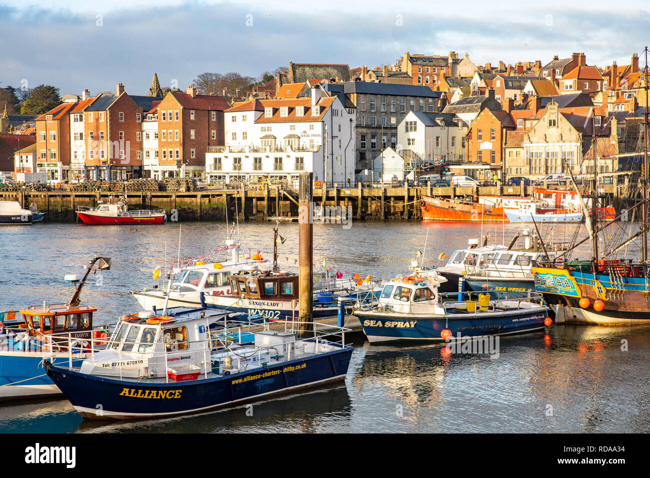 Fishing Boats And Vessels In Whitby Harbour On A Sunny Winters Day 