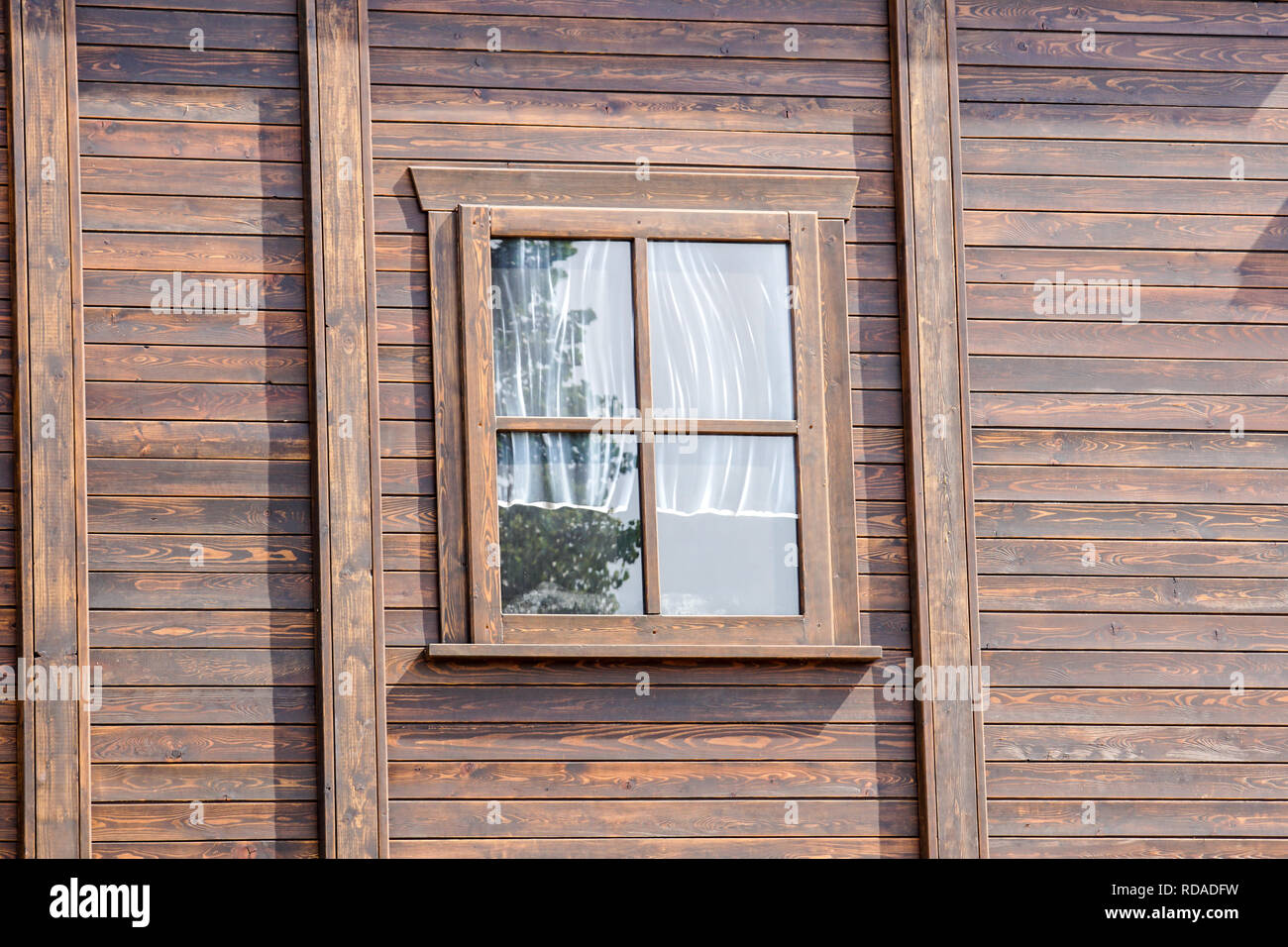 Western Style Window The external window and wall of a vintage wood house in the American ...