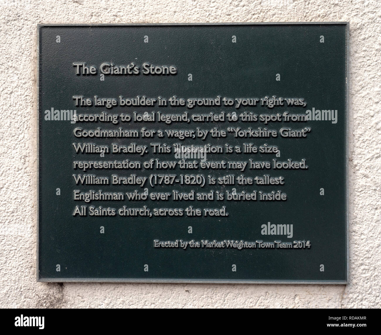 Wall plaque telling the story of the Giant's Stone, Londesborough Road, Market Weighton