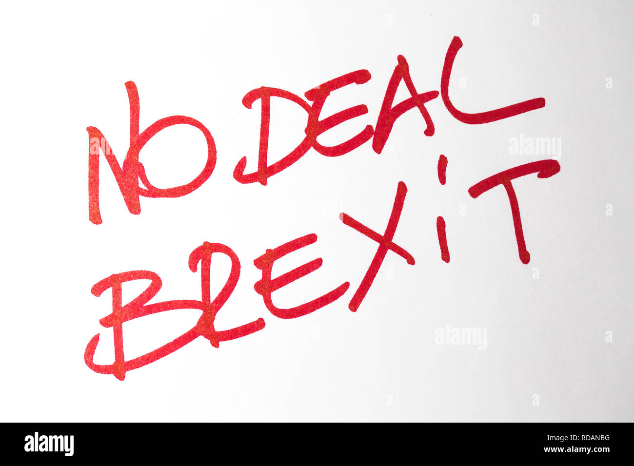 Red hand written phrase No Deal Brexit on white background Stock Photo