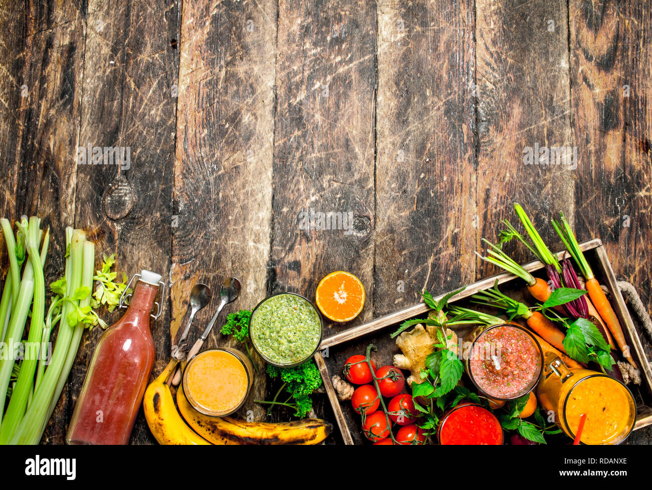 Fresh Fruit Vegetable And Berry Smoothies On A Wooden Background Stock Photo Alamy Fresh Fruit Vegetable And Berry Smoothies On A Wooden Background Stock Photo Alamy