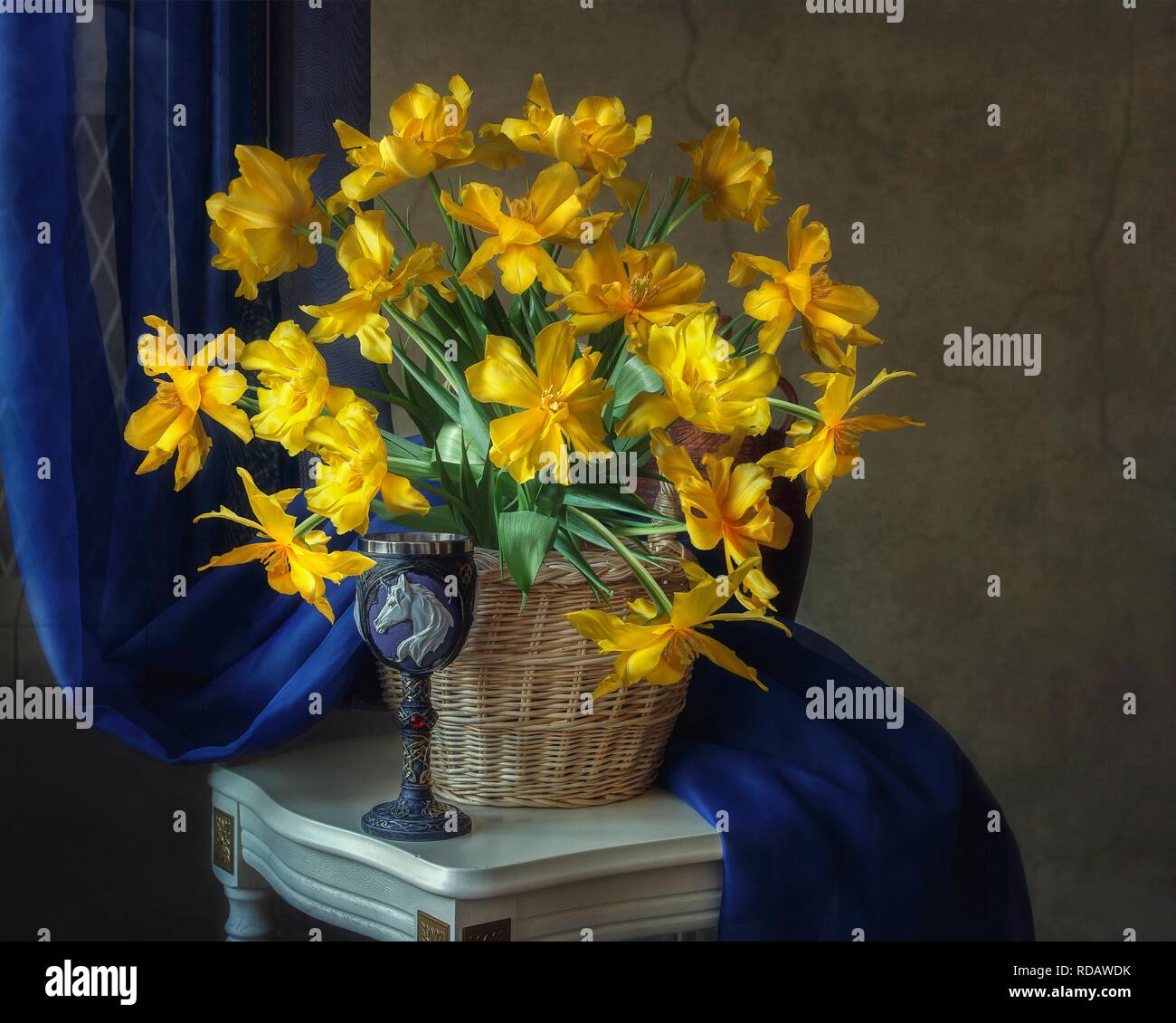 Still life with bouquet of yellow tulips Stock Photo - Alamy