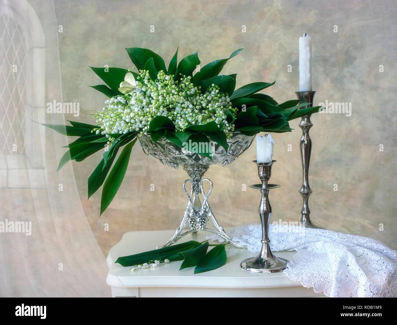 Still life with bouquet lily of the valley Stock Photo - Alamy