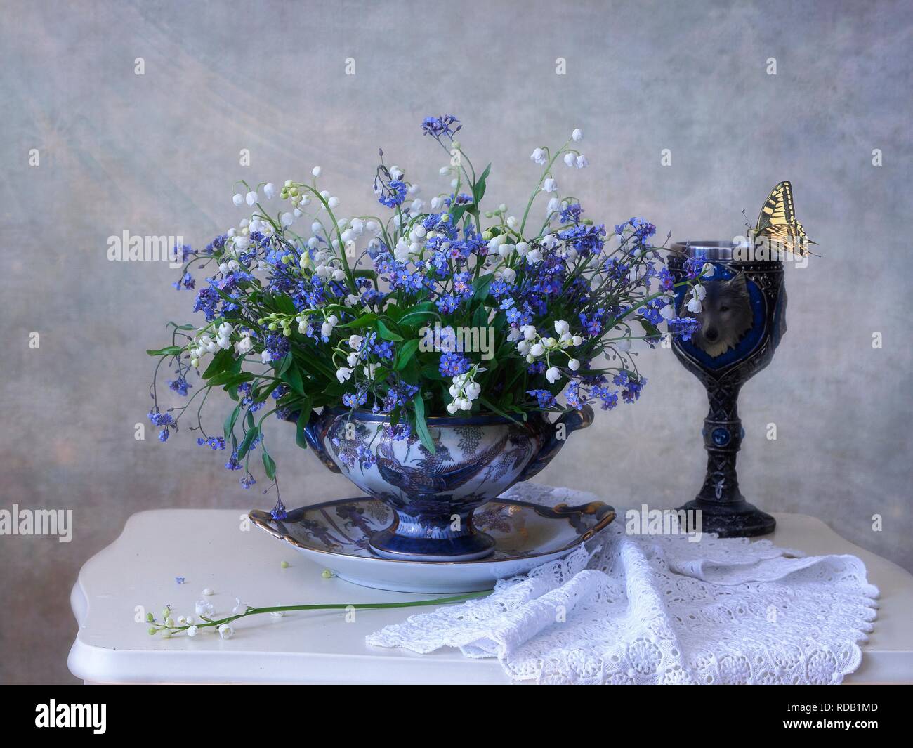 Still life with bouquet lily of the valley and forget mi not Stock ...