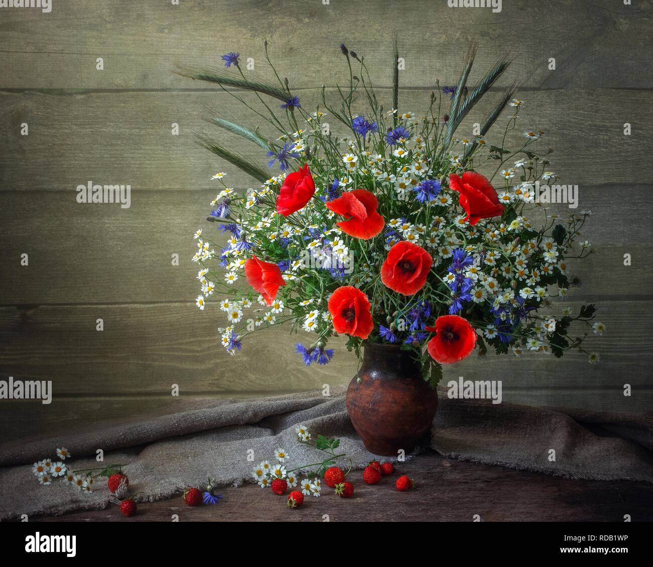 Still life with bouquet of red poppies Stock Photo - Alamy