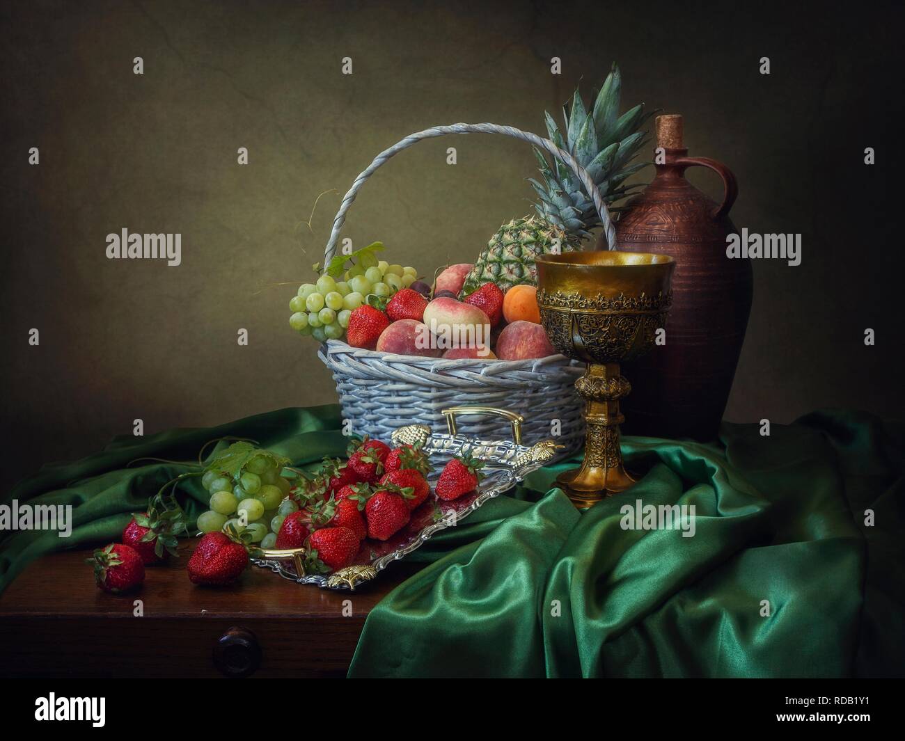 Still life with basket of fruits Stock Photo - Alamy