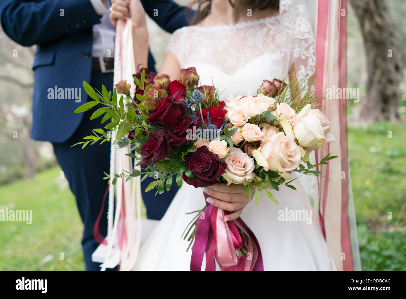 White Wedding Dress Red Rose High Resolution Stock Photography And Images Alamy