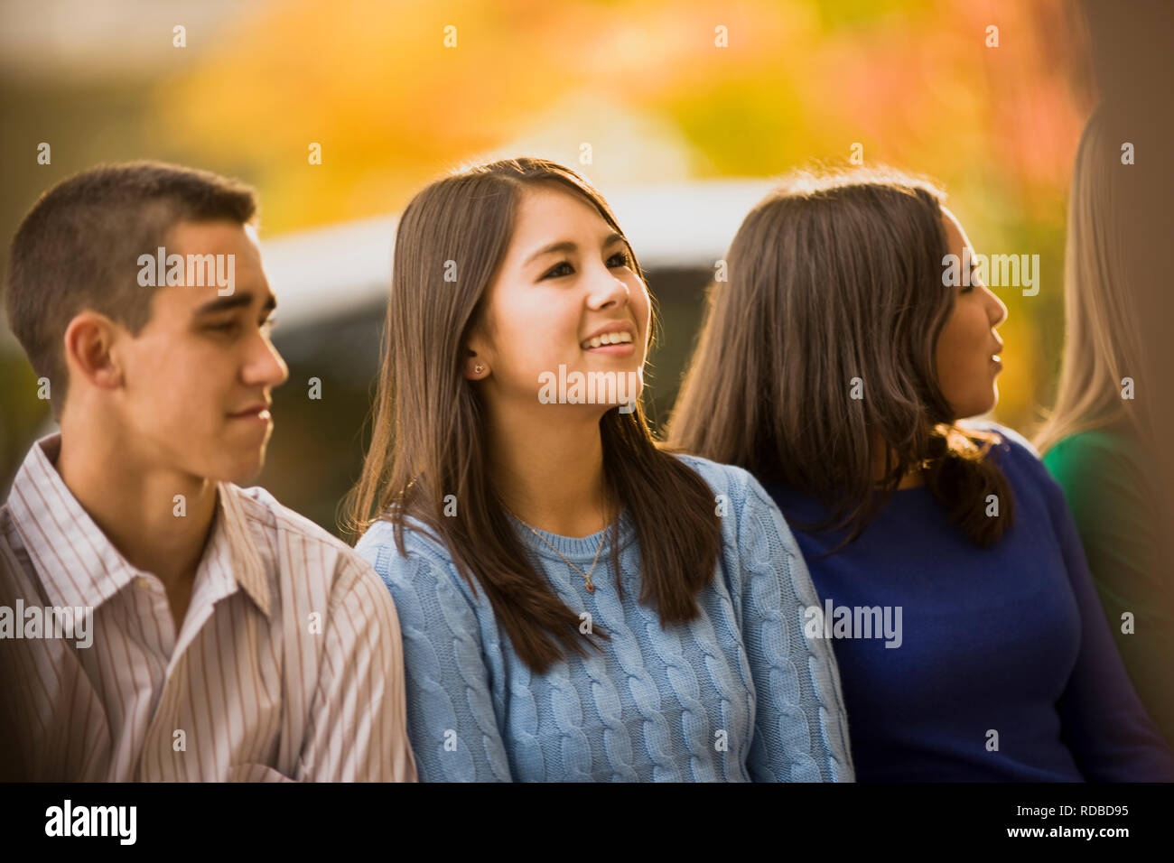 Friends smiling together Stock Photo - Alamy