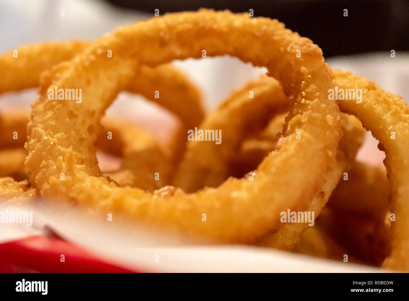 Fried beer batter onion rings hi-res stock photography and images - Alamy