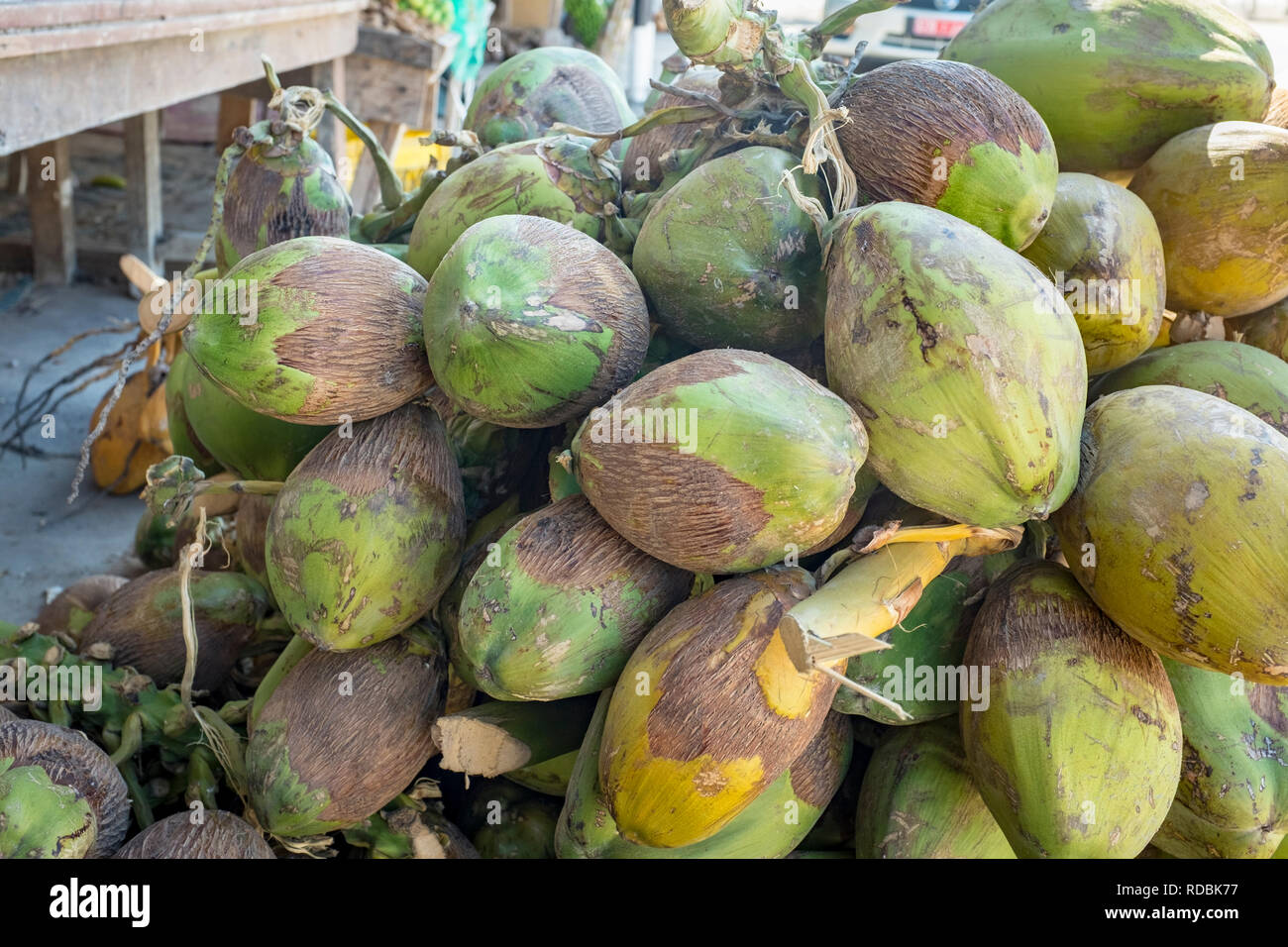 Fresh coconuts for sale at a roadside stall, Salalah, Dhofar