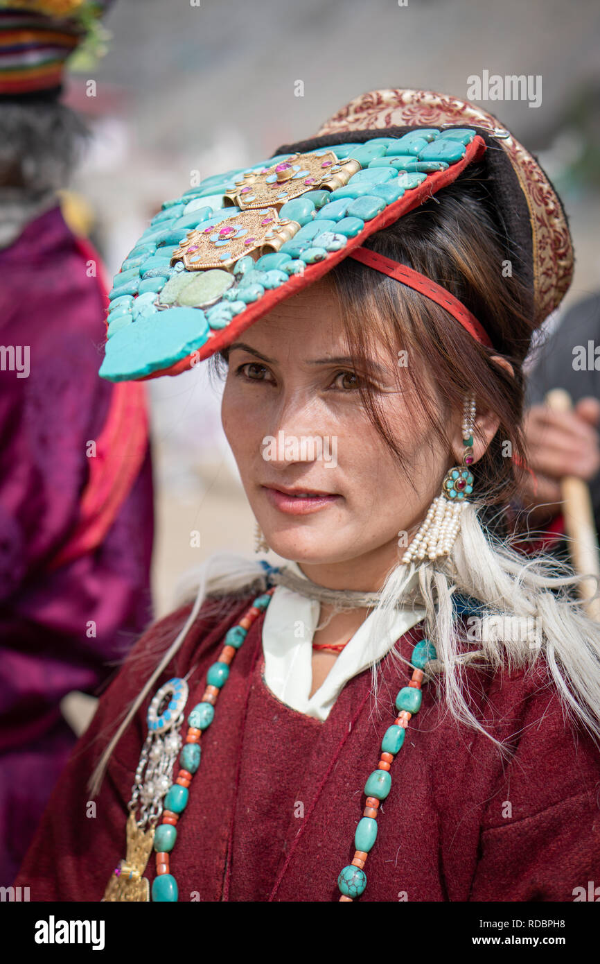 Ladakh, India - September 4, 2018: Portrait of native young Indian woman in traditional clothes on festival in Ladakh. Illustrative editorial. Stock Photo