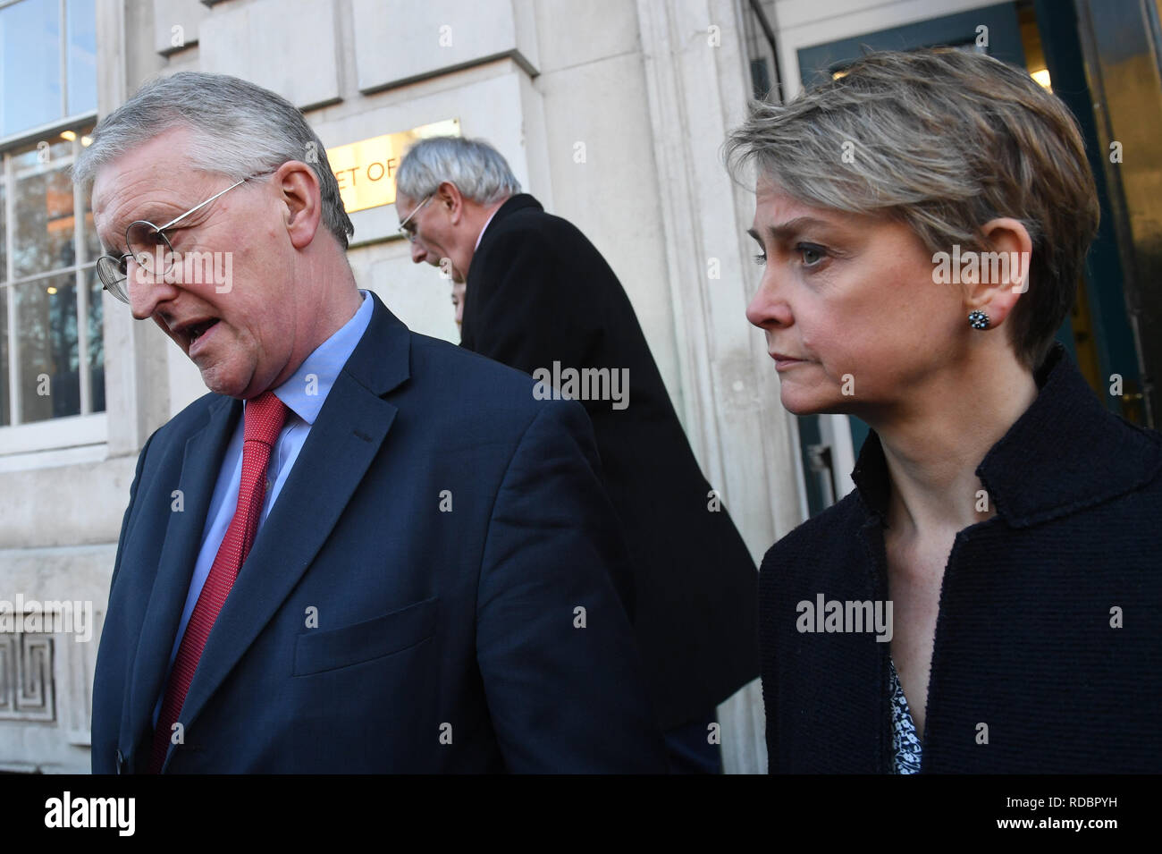 Labour MPs Hilary Benn and Yvette Cooper in Whitehall, London speaks to media as Peter Bone leaves the Cabinet Office, after the Prime Minister announced that she would invite party leaders in the Commons and other MPs in for discussion to get a Parliamentary consensus on the way forward over Brexit. Stock Photo