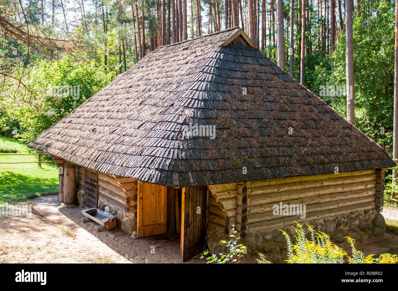 Ancient construction in the forest in summer. Stock Photo