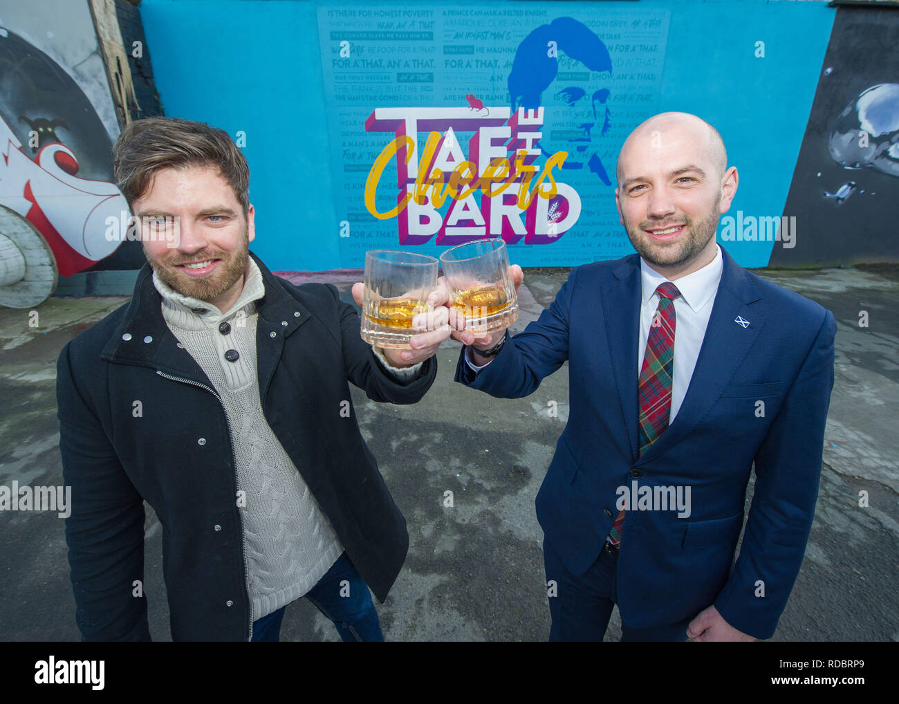 Glasgow, UK - 14th January 2019.  Minister for Europe, Migration and International Development Ben Macpherson (pictured right) unveils a new mural cre Stock Photo