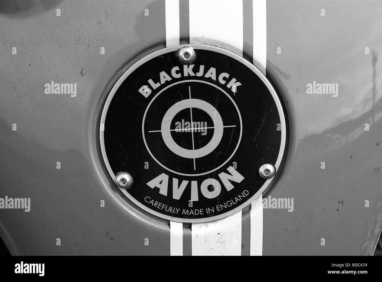 Oban, United Kingdom - February 20, 2010: blackjack avion car badge. Red badge on blue metal background. Car name and emblem. Automotive logo. Transport and transportation. Stock Photo