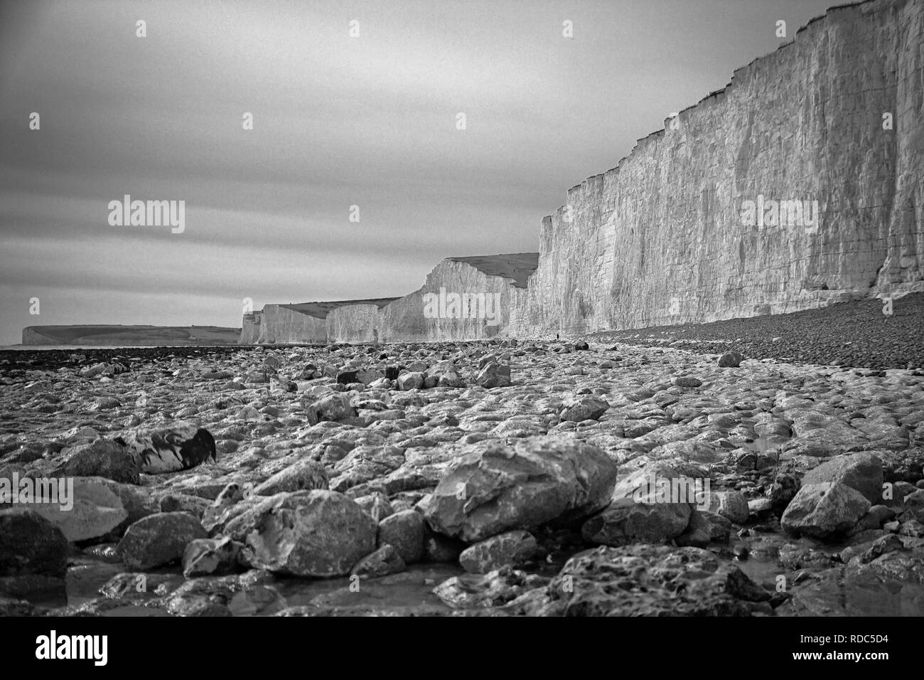 The Seven Sisters is a series of chalk cliffs by the English Channel. They form part of the South Downs in East Sussex. Stock Photo