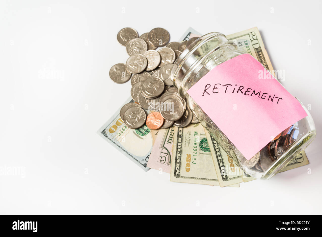 Retirement concept with a jar of money Stock Photo