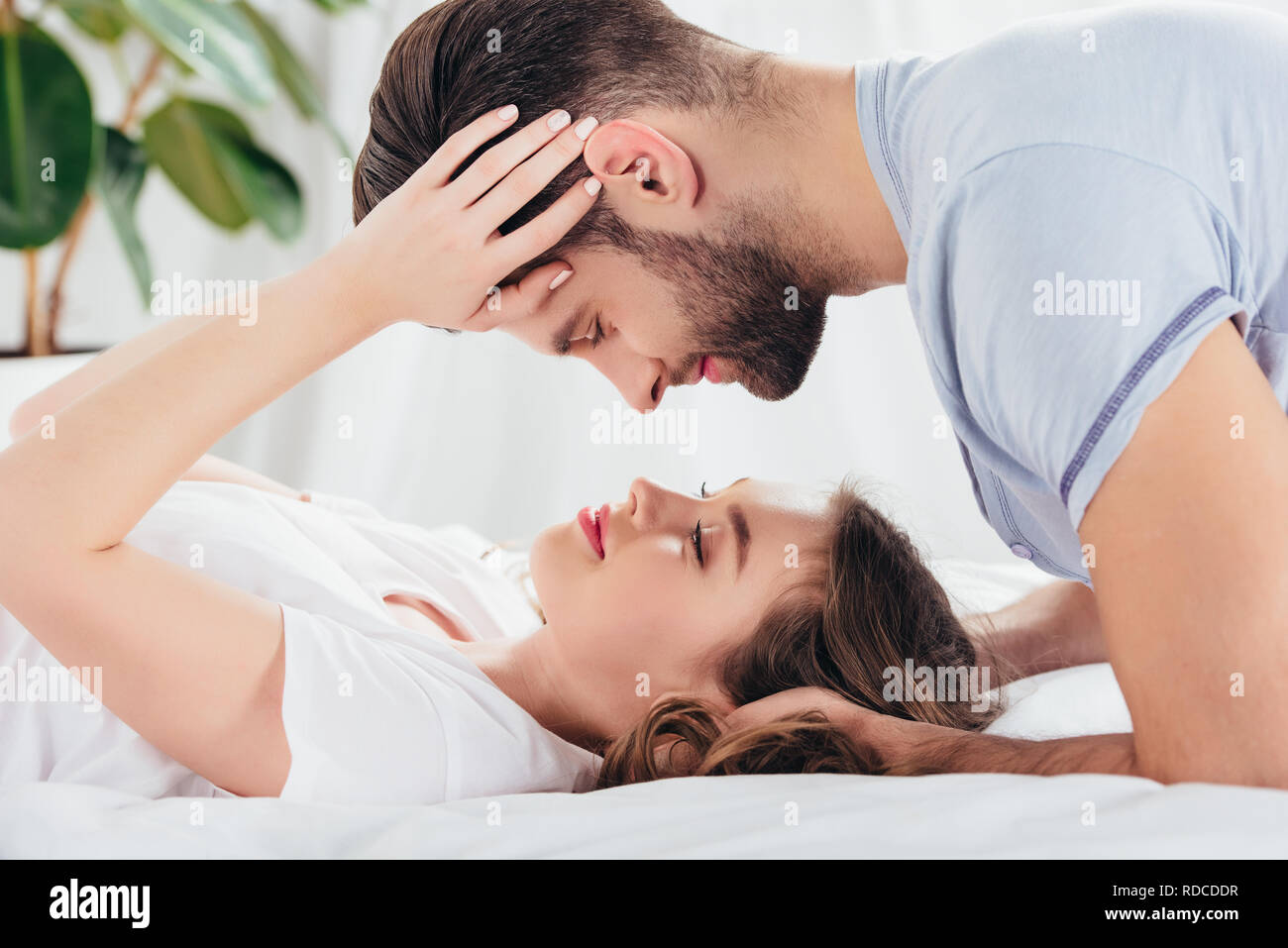 Selective Focus Of Young Loving Couple Gentle Embracing And