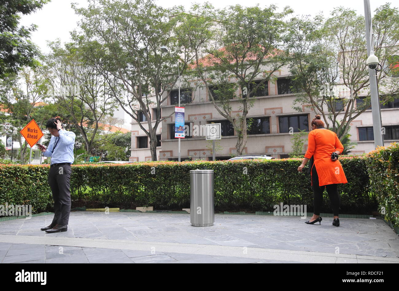 People smoke in designated smoking area in Singapore Stock Photo Alamy