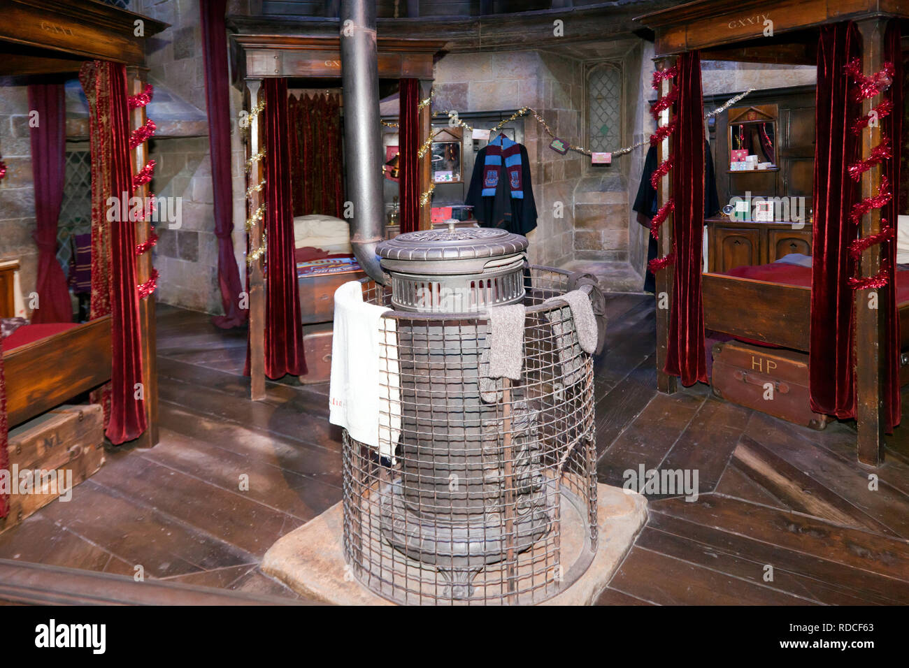 View of the Gryffindor Boys' Dormitory showing Harry Potters four  poster-bed, at the Warner Brothers Studio Tour, Leavesdon Stock Photo -  Alamy