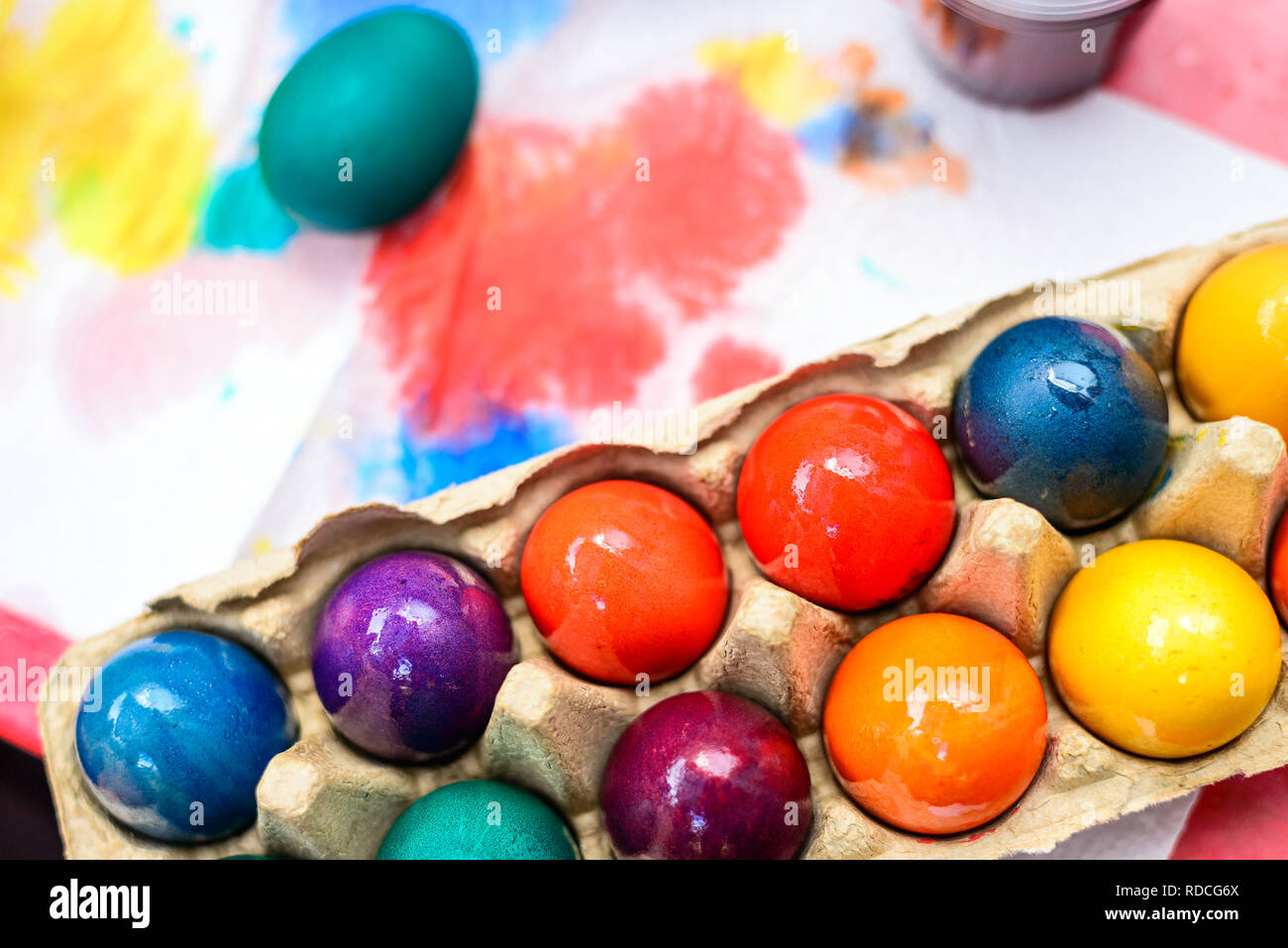 Freshly colored Easter eggs packaged in moulded carton box Stock Photo
