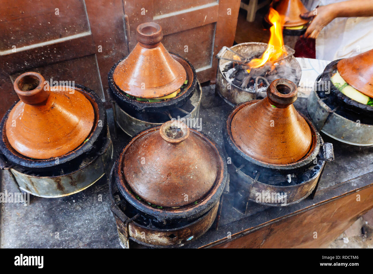 Moroccan Tagine (tajin). Street food in Morocco (Marrakesh). National and traditional cuisine of Morocco and North Africa. Stock Photo