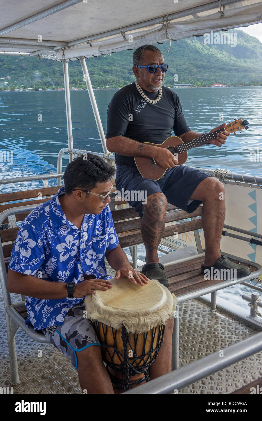 French Polynesia, Bora Bora, musicians on boat Stock Photo