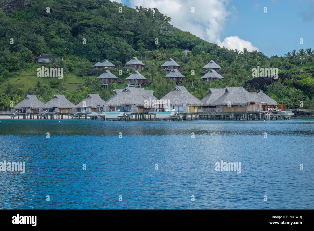 French Polynesia, Bora Bora, Motu Toopua beach bungalows Stock Photo ...