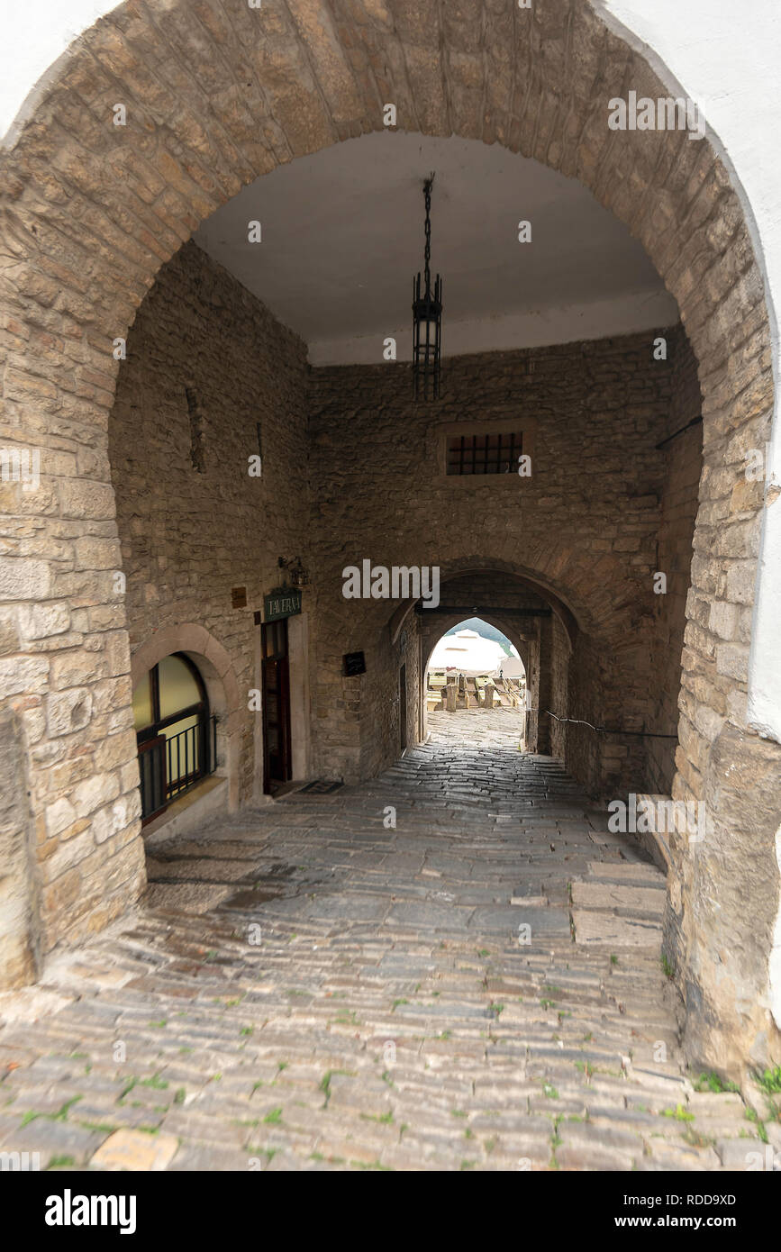 A arched passage in Motovun, Croatia Stock Photo
