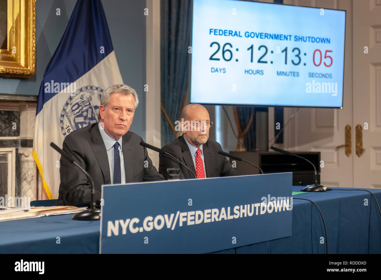 New York, USA. 17th Jan 2019. New York Mayor Bill de Blasio, left,  with Steven A. Banks, New York City Human Resources Administration/Department of Social Services, and other members of his administration hold a press conference in the Blue Room in New York City Hall on Thursday, January 17, 2019 on the effects of the government shutdown on funding of services in New York. As the shutdown progresses funding for Section 8 vouchers, SNAP benefits and an assortment of other services will cease putting New Yorkers who rely on them at risk.  Credit: Richard Levine/Alamy Live News Stock Photo