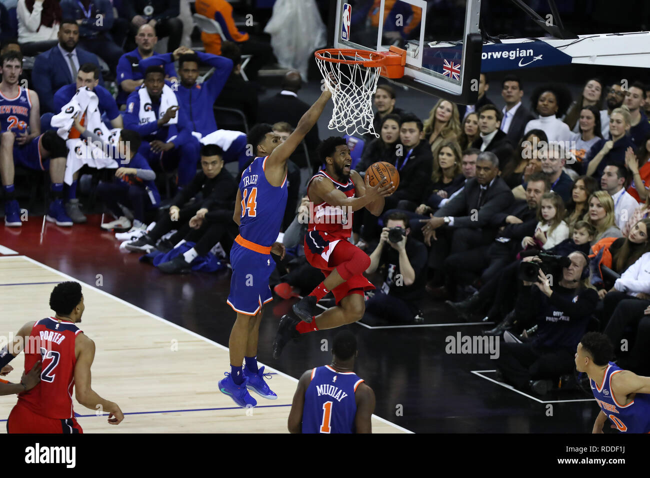 London, UK. 17th January 2019, The O2 Arena, London, England; NBA London Game, Washington Wizards versus New York Knicks; Chasson Randle of the Washington Wizards shoots a reverse lay up from under the net Credit: Action Plus Sports Images/Alamy Live News Stock Photo