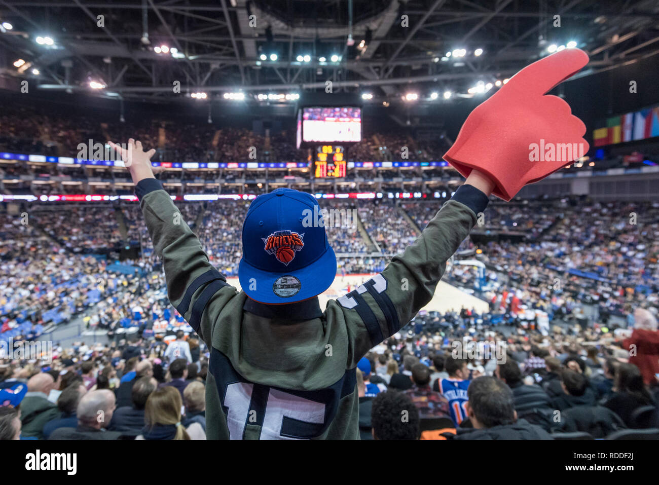 Londo , UK.  17 January 2019. A young Knicks fan celebrates during an NBA basketball game, NBA London 2019, between Washington Wizards and New York Knicks at the O2 Arena.  Final score: Wizards 101 Knicks 100.  Credit: Stephen Chung / Alamy Live News Stock Photo